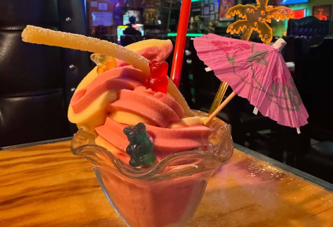 Frozen margarita with a paper umbrella at El Fogón in Hixson, TN